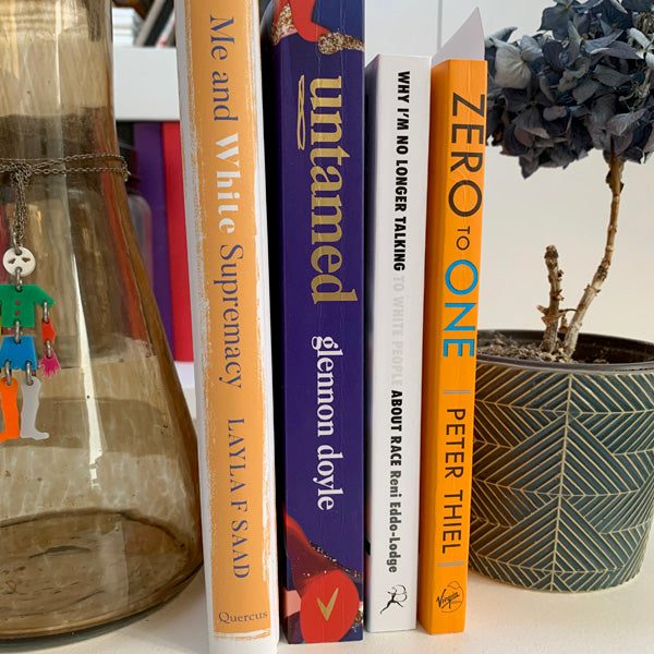 Books stacked, Ella Saltmarshe at TED